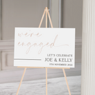 engagement welcome sign on white acrylic with gold lettering 