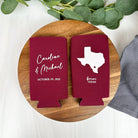 Custom wedding slim can coolers in the color of maroon, featuring a state outline