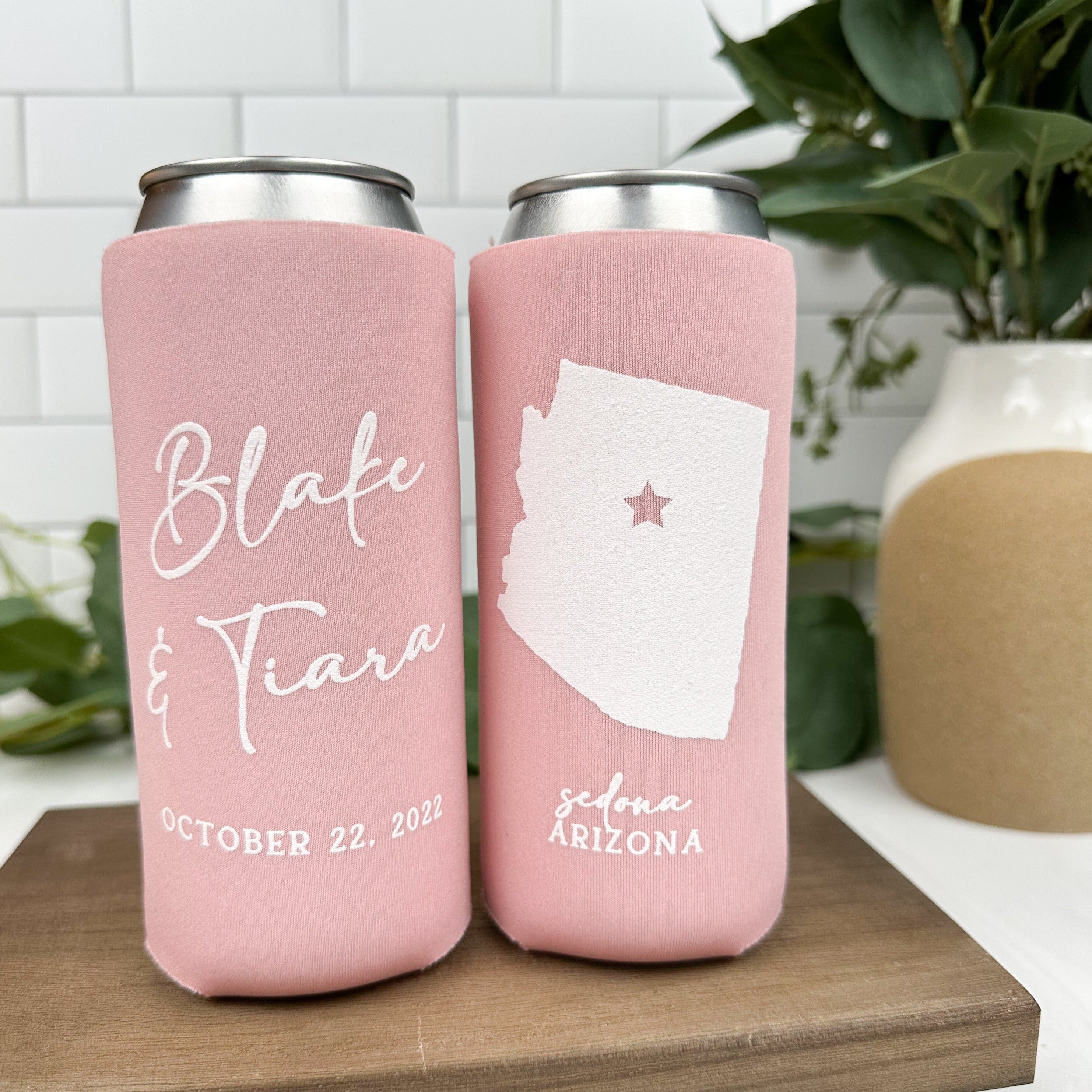 Custom wedding slim can coolers in the color of dusty rose, featuring a state outline